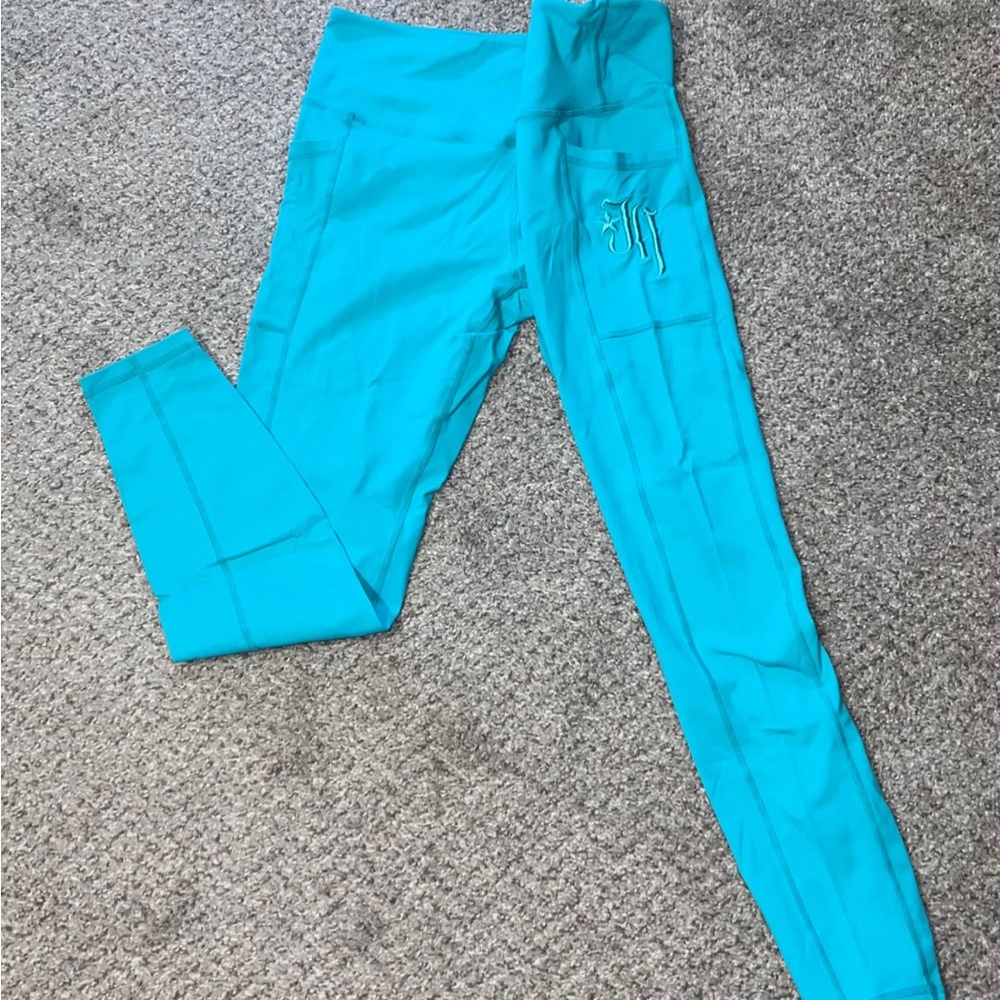 Jekyllhyde Blue leggings size Large w/ side pocket.